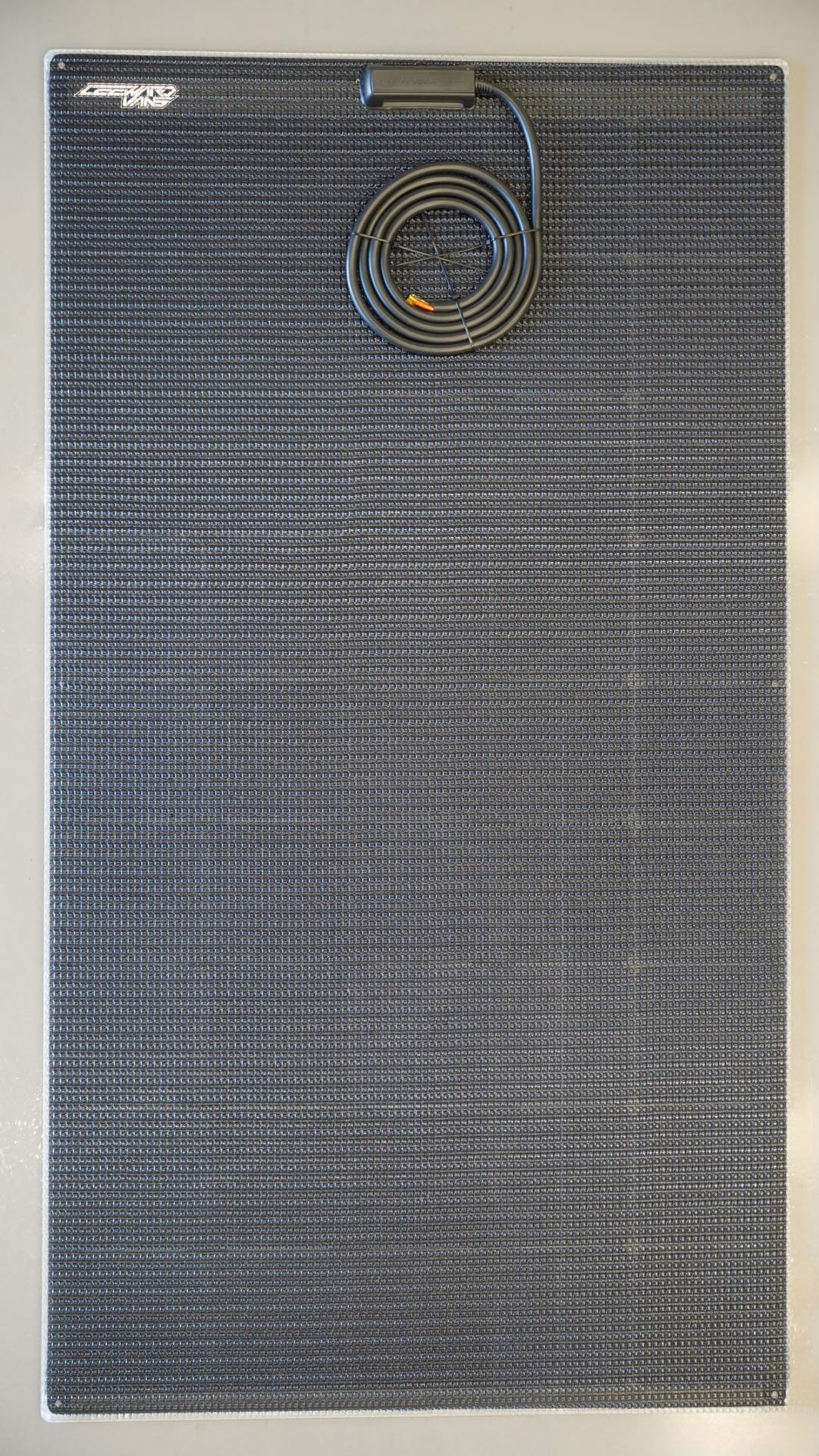 Walkable Carbon Solar Panel designed for high-efficiency power in Sprinter and Transit campervans, RVs, and off-grid setups. Ideal for van conversions and marine environments, this lightweight and durable panel features an ETFE surface and is built to withstand diverse weather conditions for reliable energy on the go